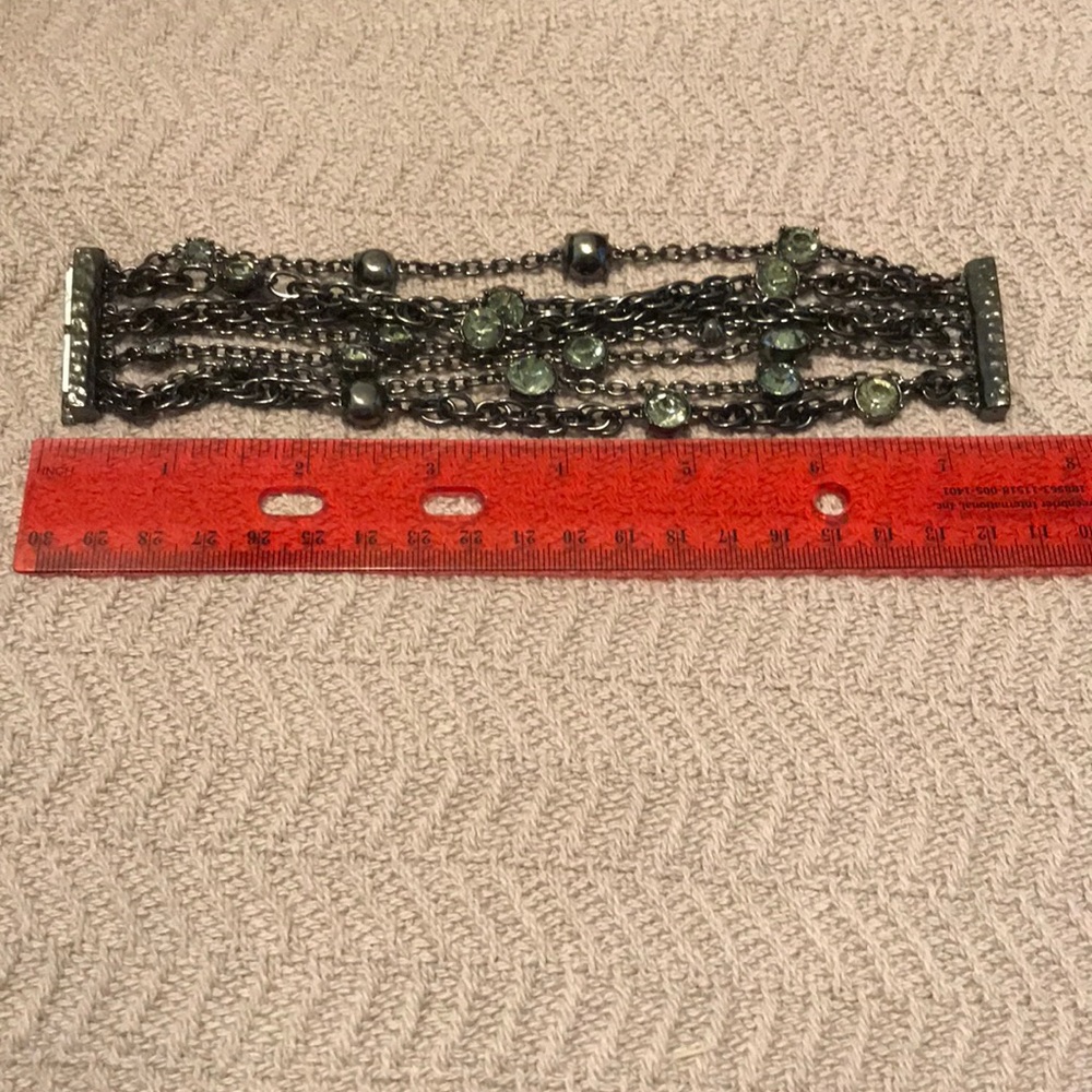 NWOT 7 strand bracelet with gray crystals